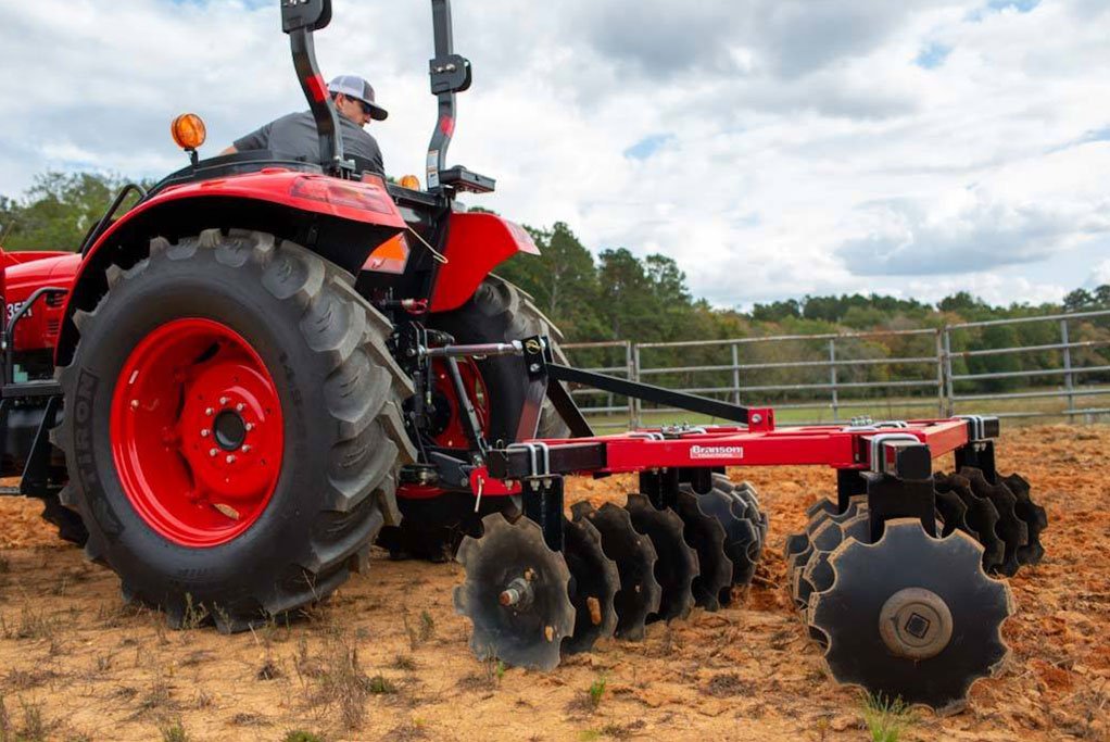 Farm Tractor with Implement Attachment
